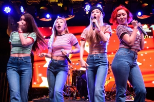 AUSTIN, TEXAS - MARCH 16:  Solar, Wheein, Moonbyul and Hwasa of Mamamoo perform during the K-Pop Night Out SXSW showcase at The Belmont on March 16, 2016 in Austin, Texas.  (Photo by Daniel Boczarski/Redferns)